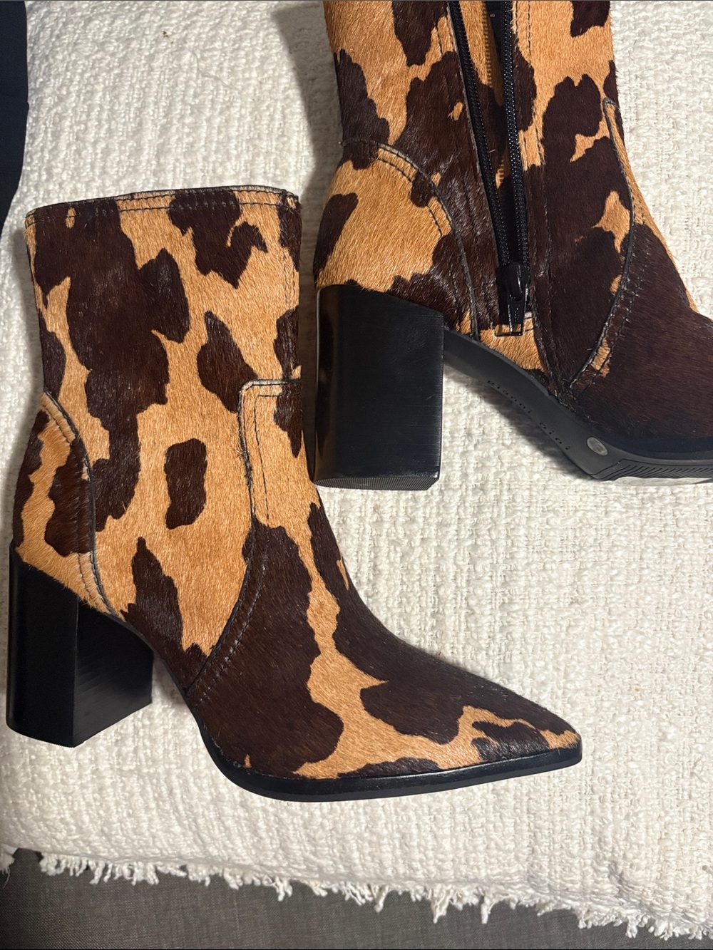 Gianni Bini Cowhide-Print Pointed Toe Ankle Boots in Brown and Tan
